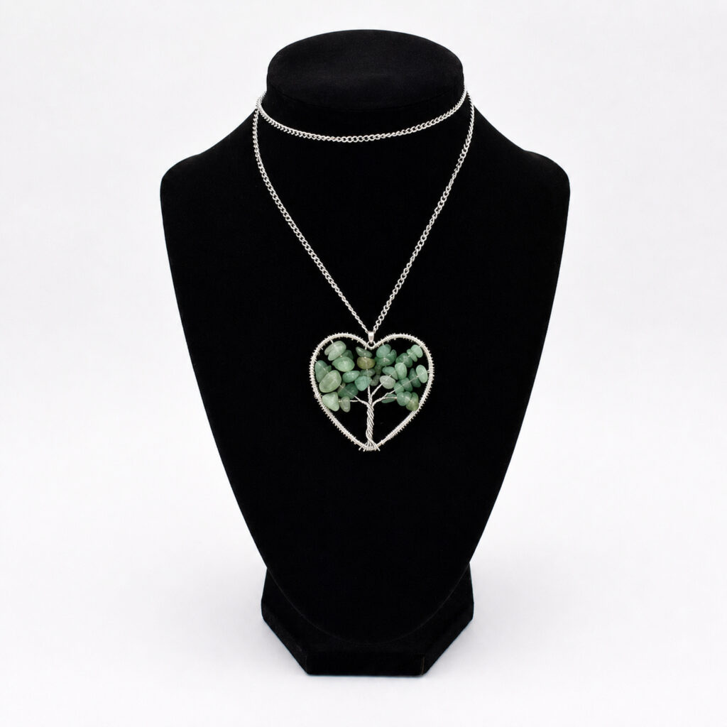 Silver-tone heart-shaped tree necklace with green stone chip leaves pendant
